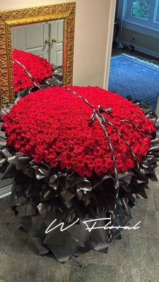 Bold 999 red rose statement installation for proposals in Toronto