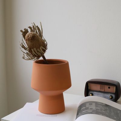 Colourful decorative flower vase inspired by warm sunset tones