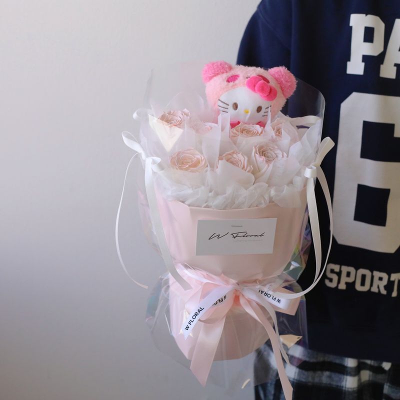 Preserved rose bouquet paired with adorable Hello Kitty plush