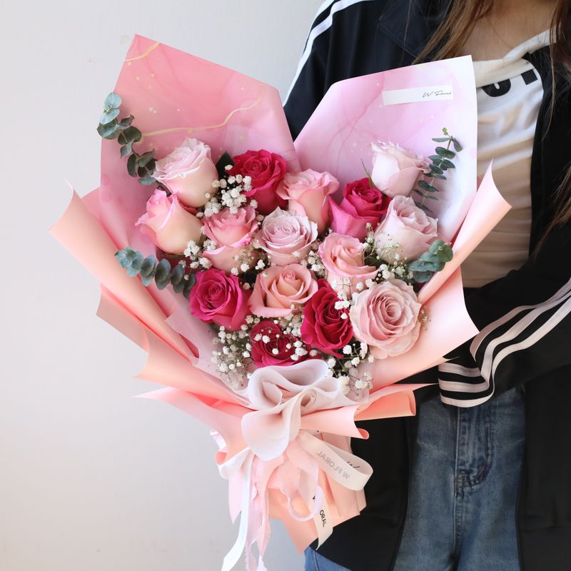 Mixed hot pink and pink rose bouquet by W Floral Studio Toronto