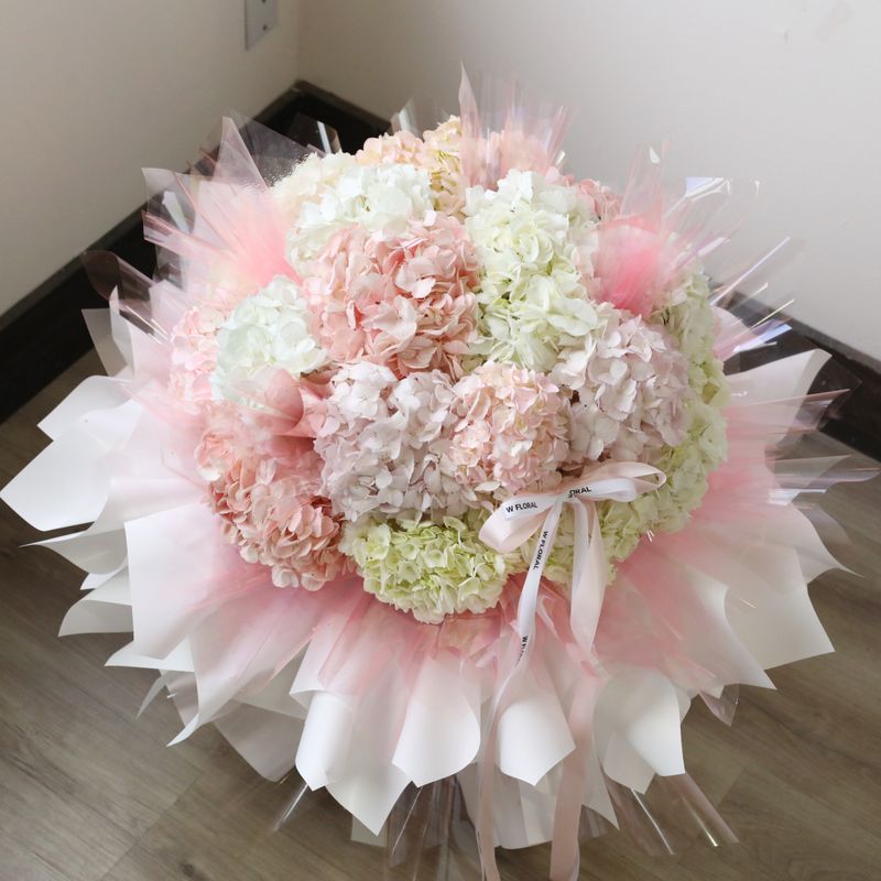 Luxury blush hydrangea bouquet with signature wrapping
