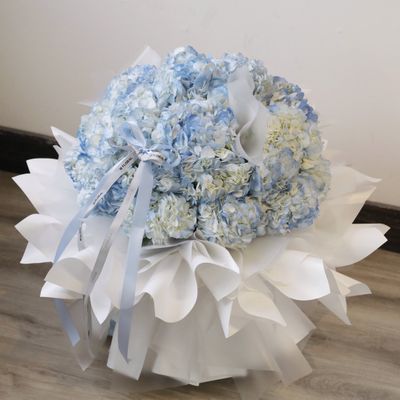 Blue hydrangea bouquet by W Floral Studio