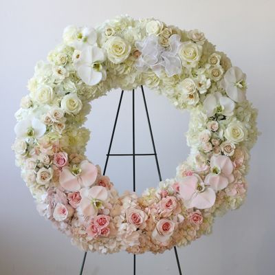 Luxury ivory orchid hydrangea and rose sympathy wreath