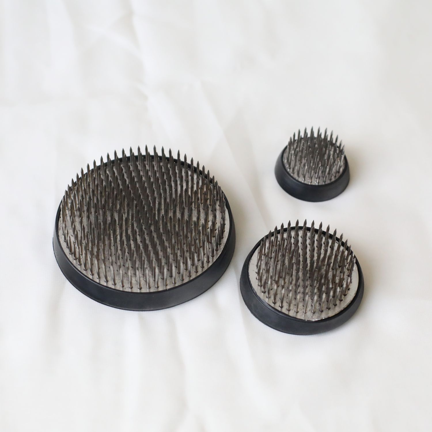 Metal floral pin holder for creative flower arranging
