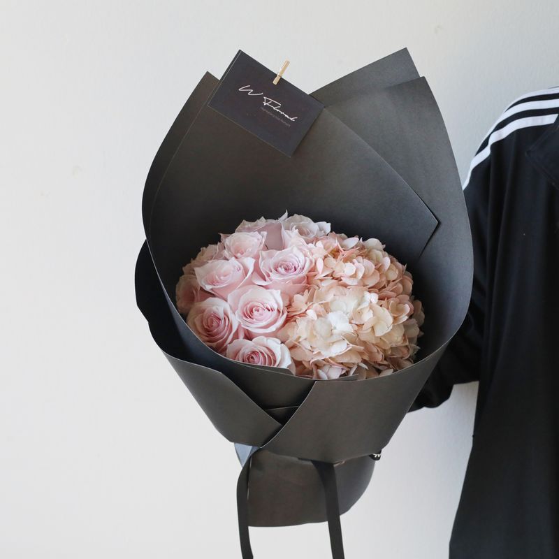 Blush noir hydrangea and rose bouquet with romantic moody tones