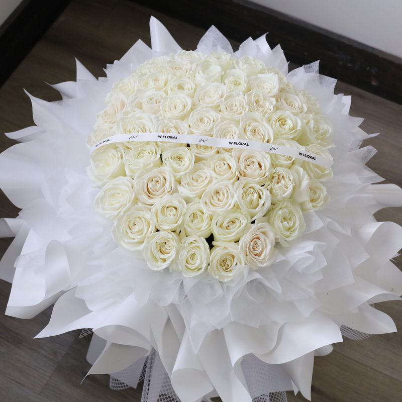 Grand and luxurious white rose round bouquet by W Floral Studio Toronto