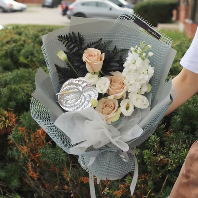 Yurae Grey Muse blush rose bouquet with grey wrapping by W Floral Studio Toronto