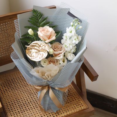 Yurae Grey Muse blush rose bouquet with grey wrapping by W Floral Studio Toronto