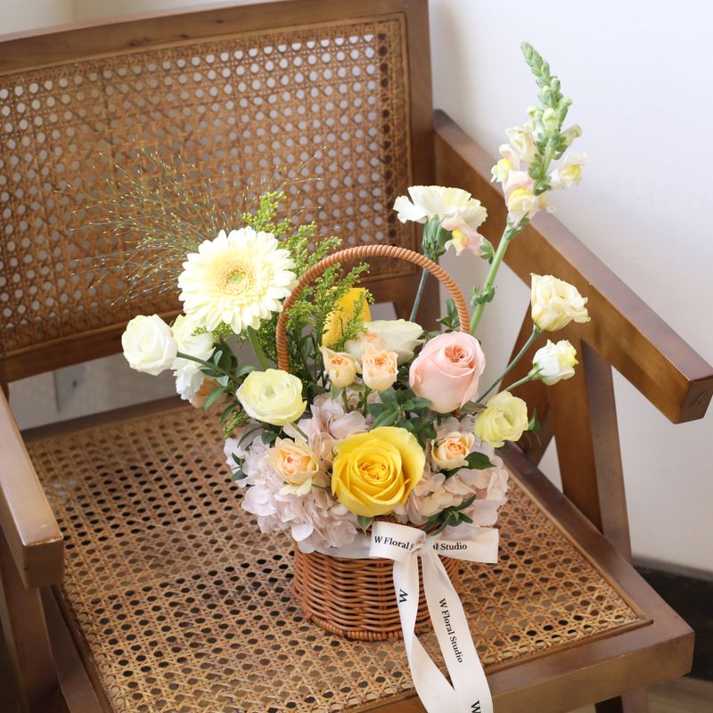 Fresh floral gift basket with seasonal blooms