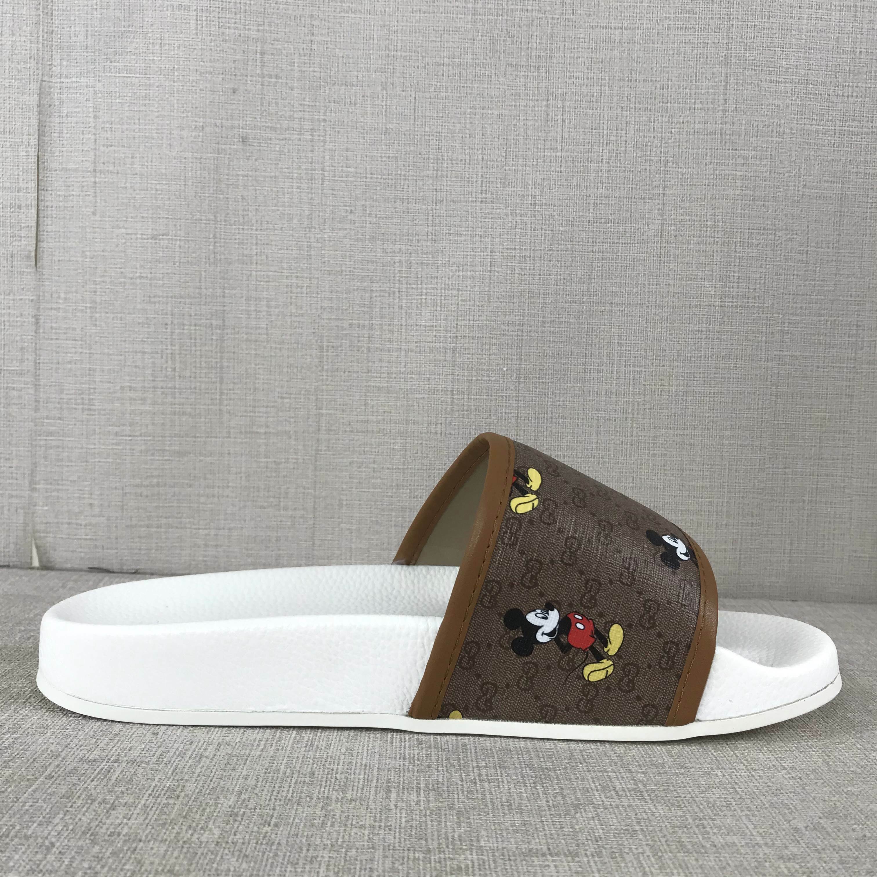 CIABATTE GUCCI X DISNEY SLIDER GG BIANCO