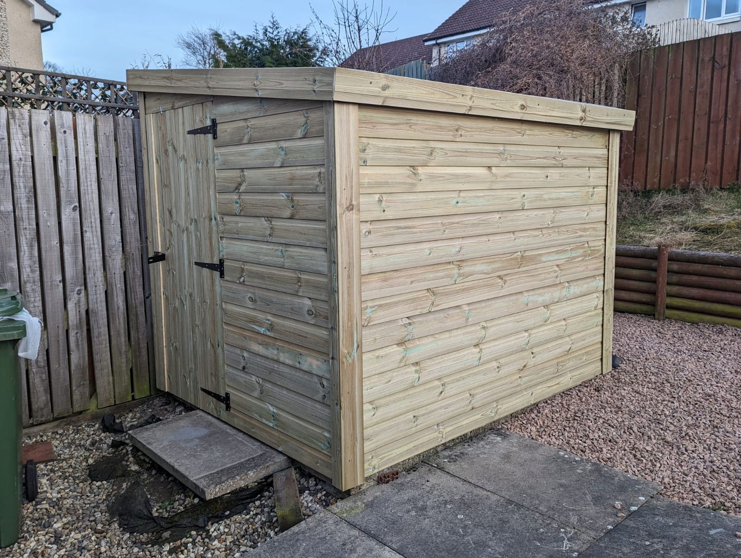 Pent Shed with Door in Side Panel