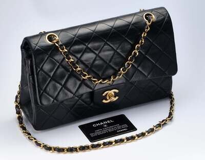 VINTAGE CHANEL BAG medium, double flap, quilted black lambskin
