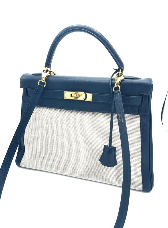 HERMÉS KELLY 2 WAY BAG Retourne 32 cm , Courchevel marine Leder und beige Canvas, Y - 1995