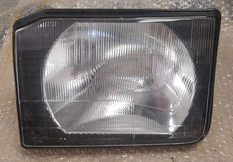 USADO . Faro izquierdo Land Rover Discovery 2 REF XBC105150
