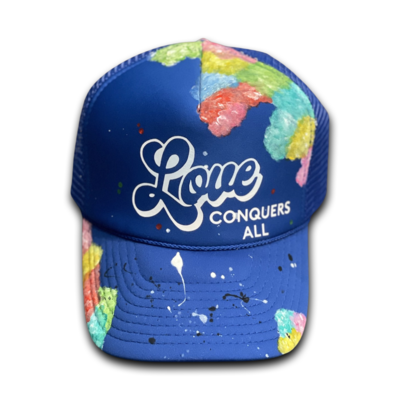 Royal Blue “Love Conquers All” Trucker Hat