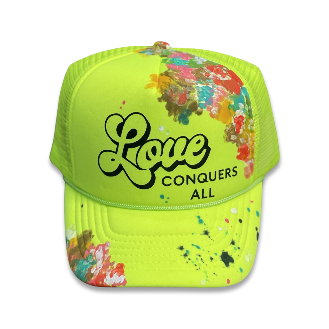 Neon Yellow “Love Conquers All” Trucker Hat