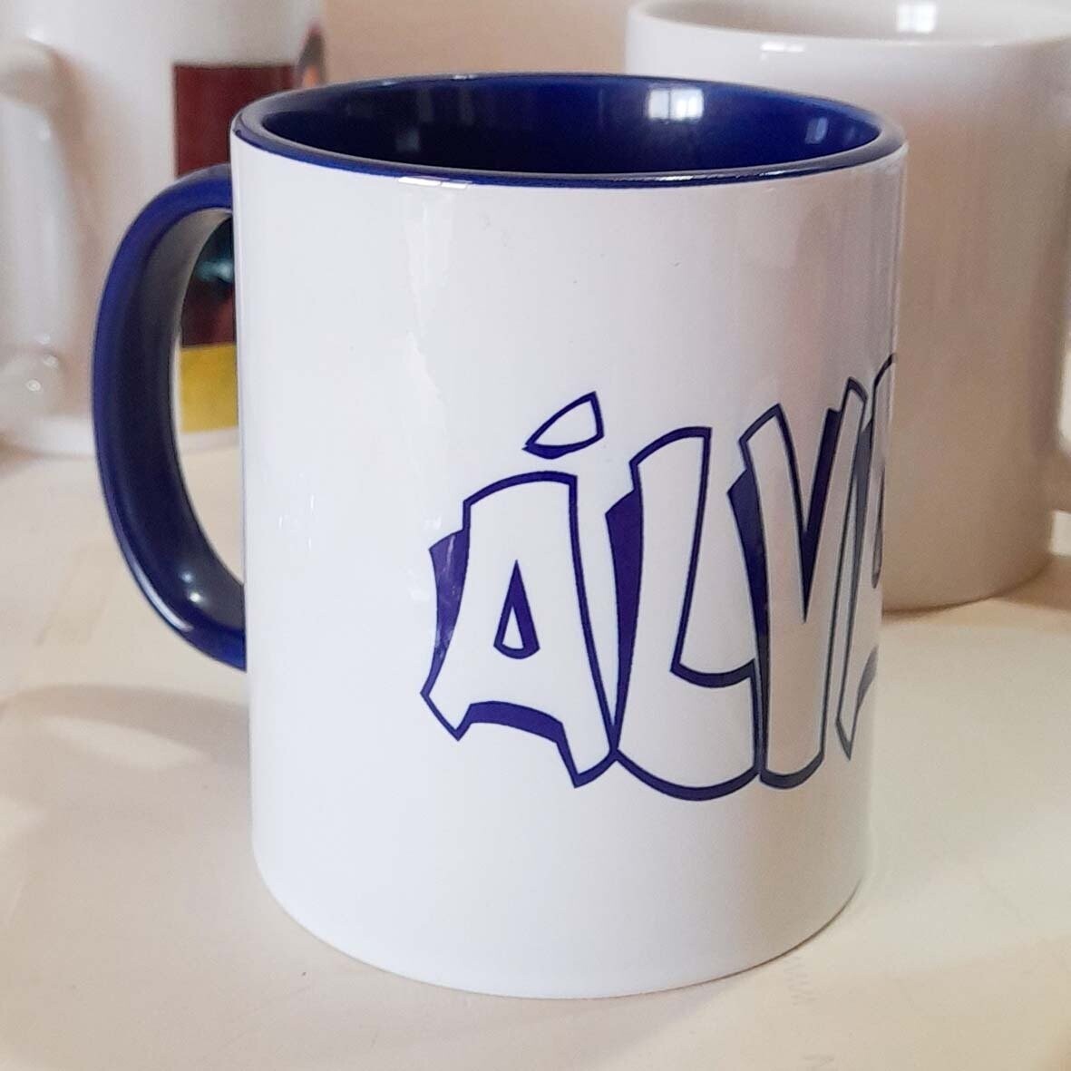 Taza con asa de color 'Texto'