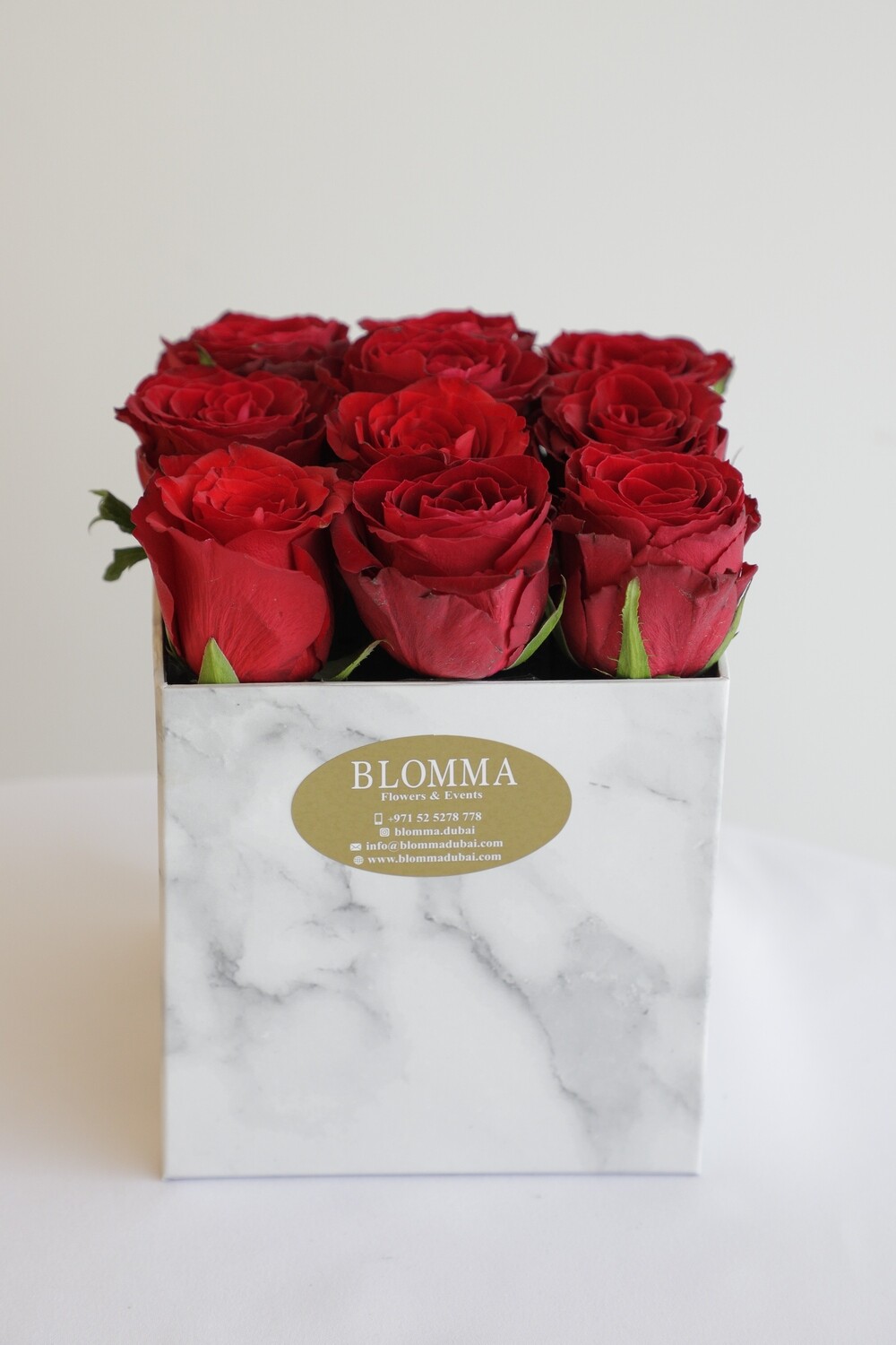 Red Flowers With Square Marble Box