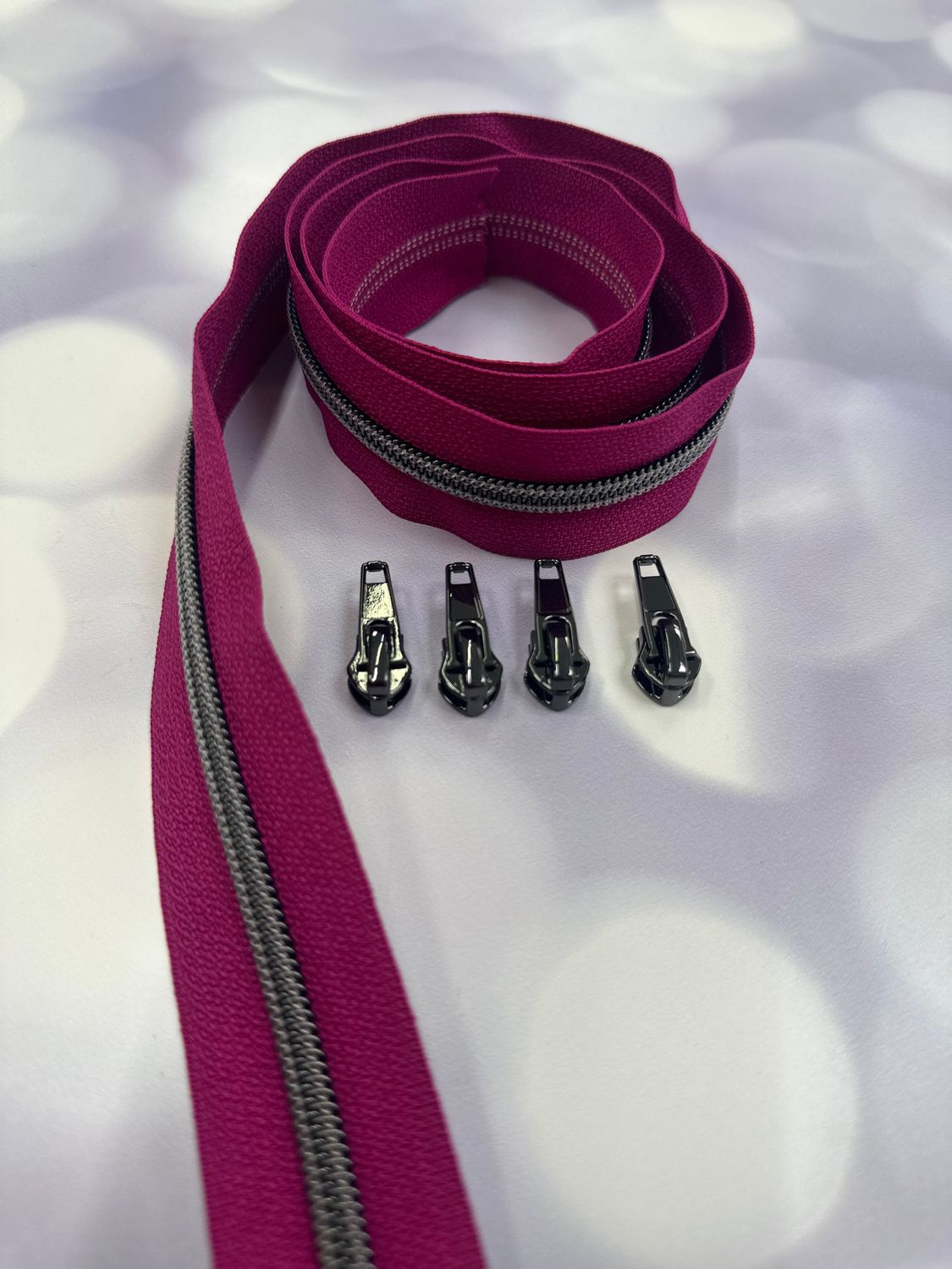 Endlosreißverschluss 1m - fuchsia (schwarz)