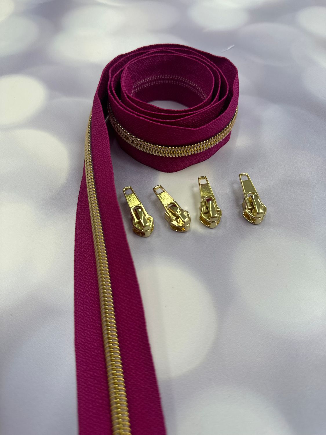 Endlosreißverschluss 1m - fuchsia (gold)