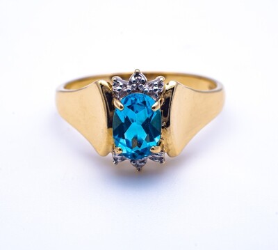 10k Gold Ring With Blue Stone and Diamonds. SIZE-7