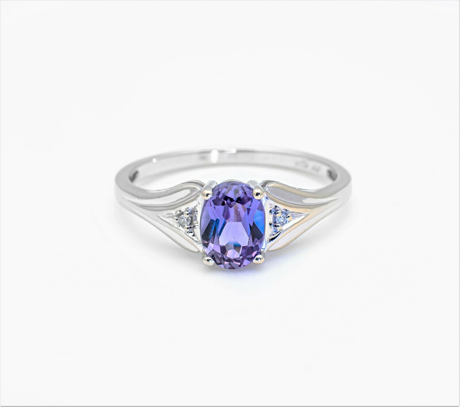 10k Gold Ring with Sapphire and Diamonds. SIZE-7