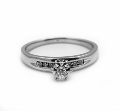 10k Gold Ring With Diamonds. SIZE-7.0