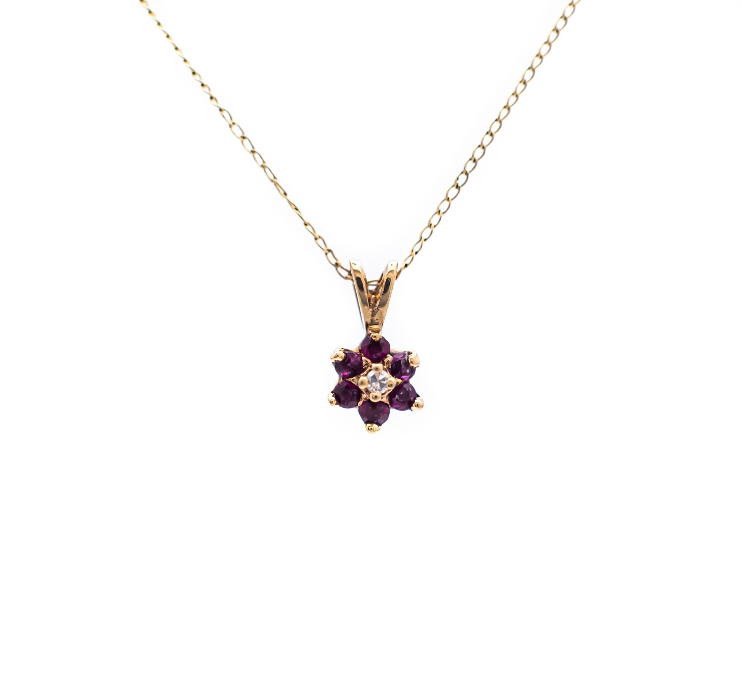 10k Gold Pendant with pink Topaz and Diamond.