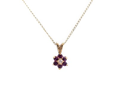 10k Gold Pendant with pink Topaz and Diamond.