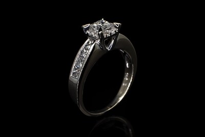 Princess and Round Diamond Ring