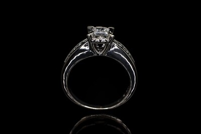 Princess and Round Diamond Ring
