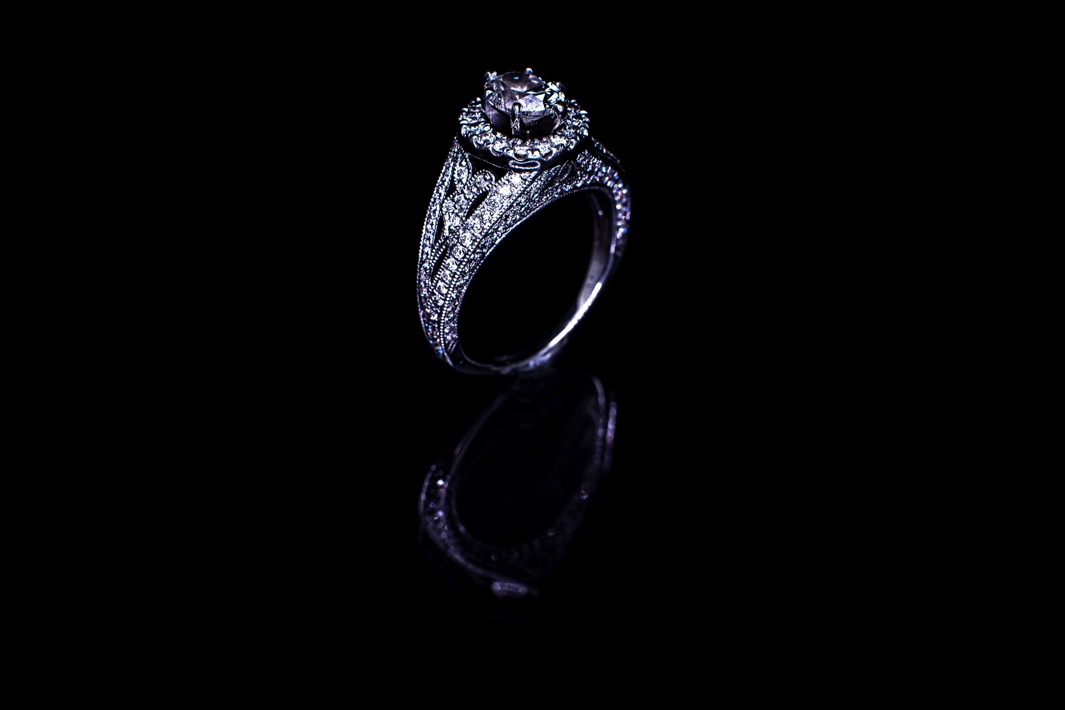 Oval Diamond and Pave Set Ring