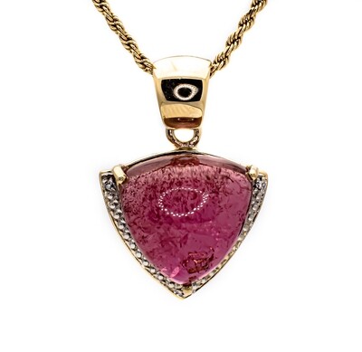 10k Gold Pendant with pink Gemstone.