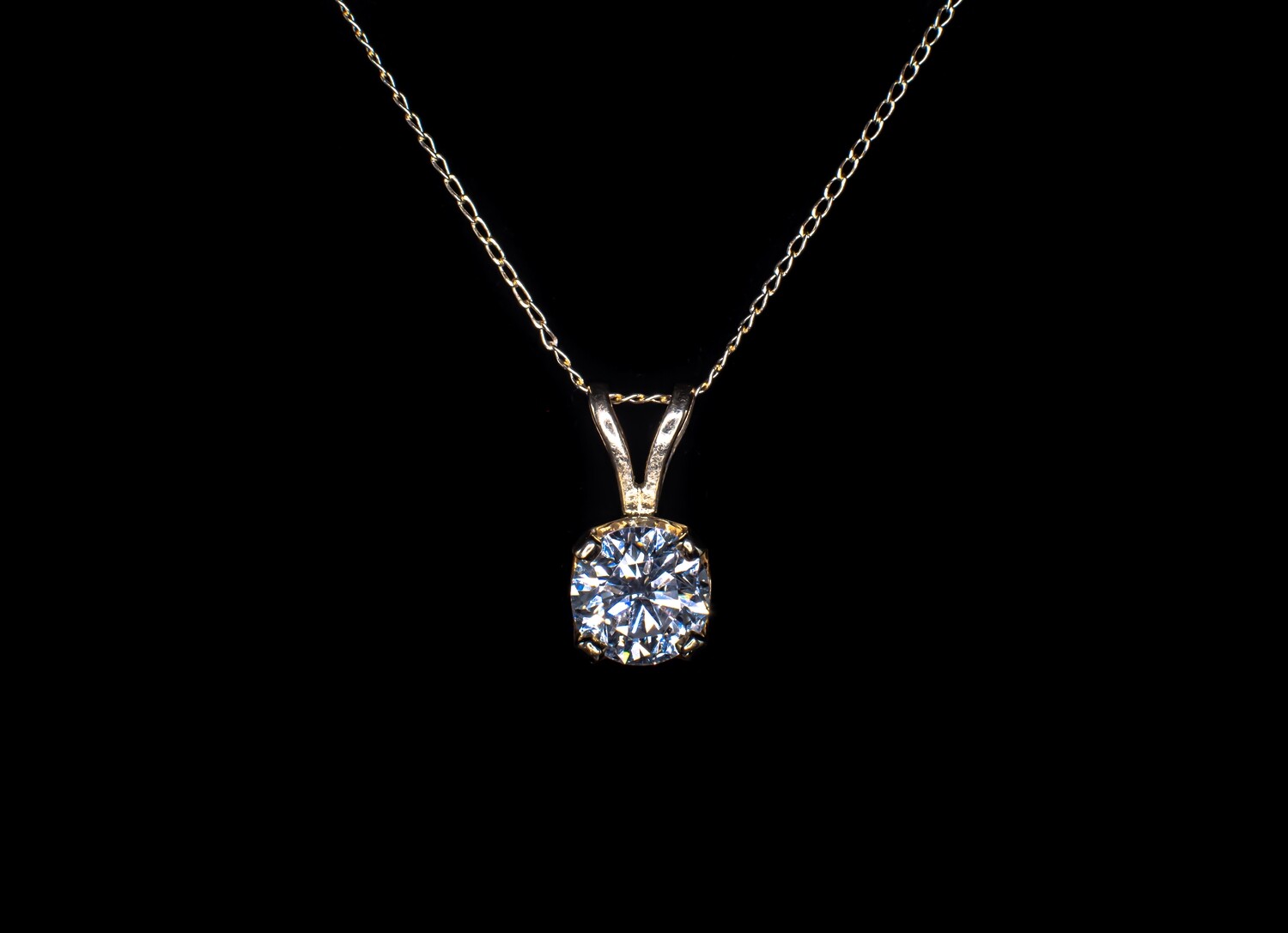 Gold Chain and Diamond Pendant