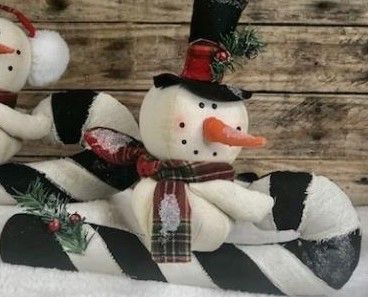 Black Hat Snowman on Candy Cane