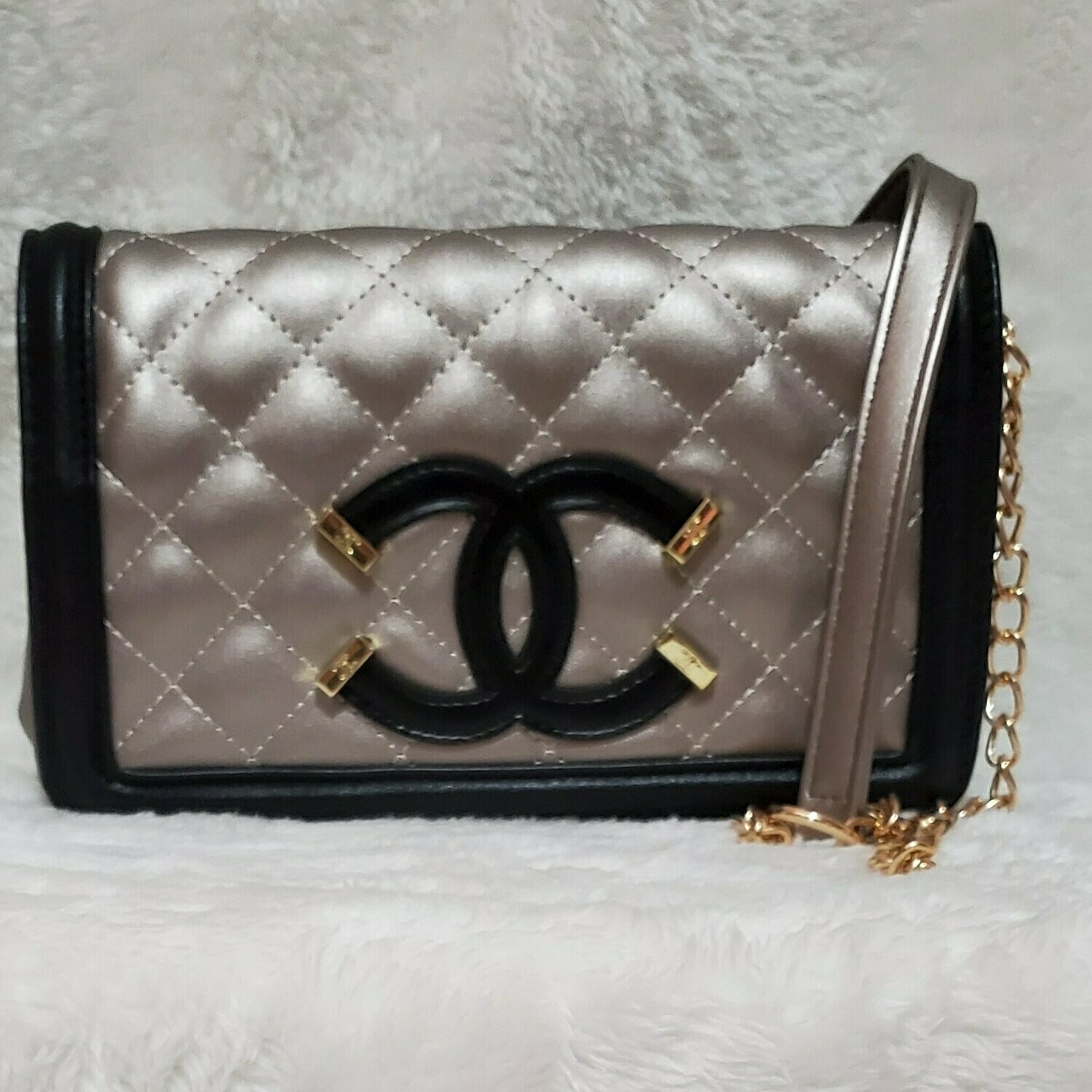 CHANEL (GOLD with BLACK trim)