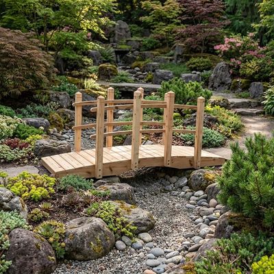 A 10 ft. wooden bridge in a rock garden.