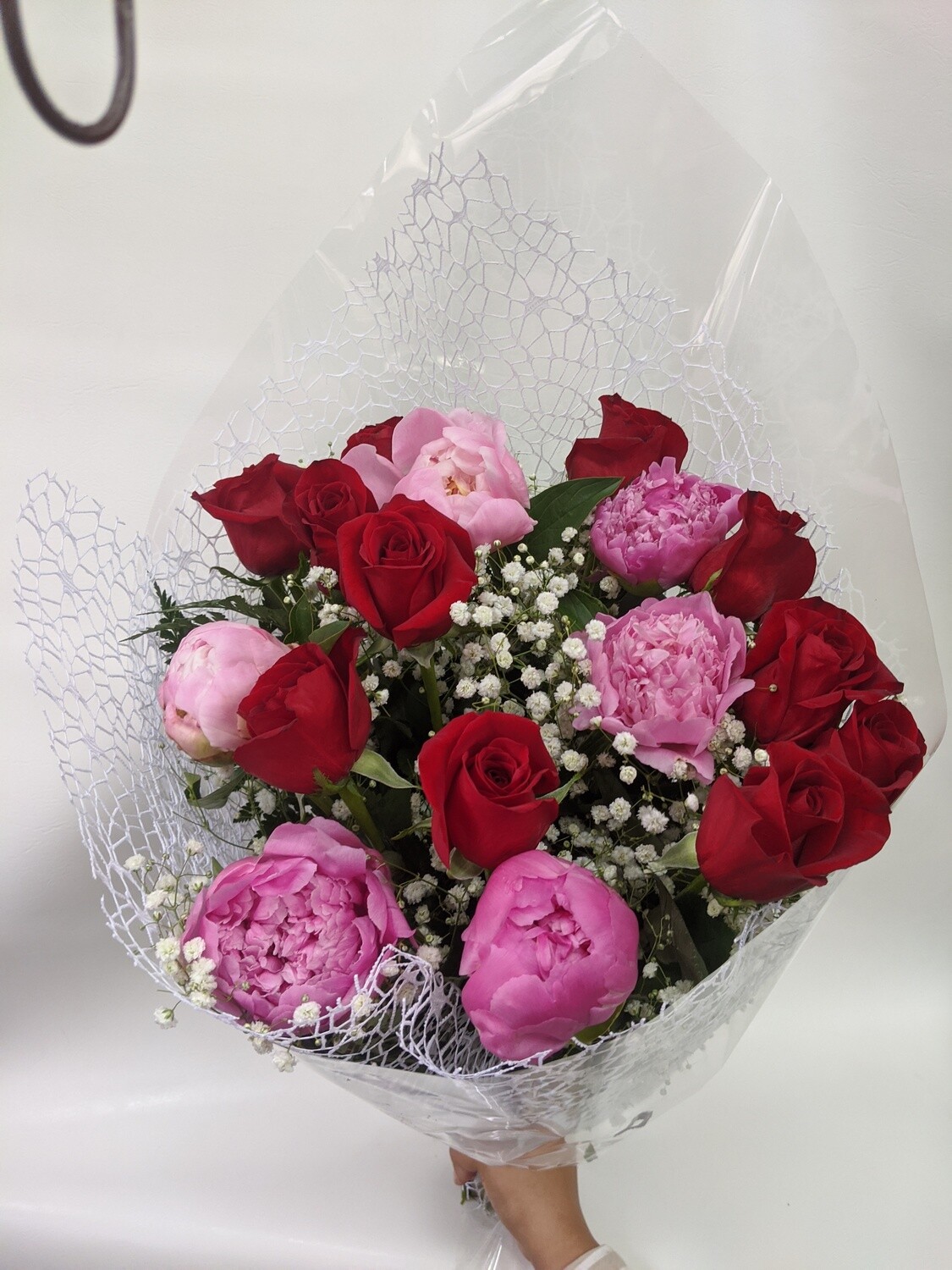 Handheld Bouquet Of Dozen Roses And Peonies Handheld Bouquet Of Dozen Roses And Peonies