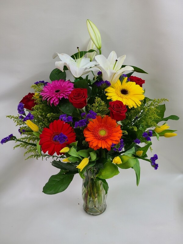 Spring Time Flowers In Vase