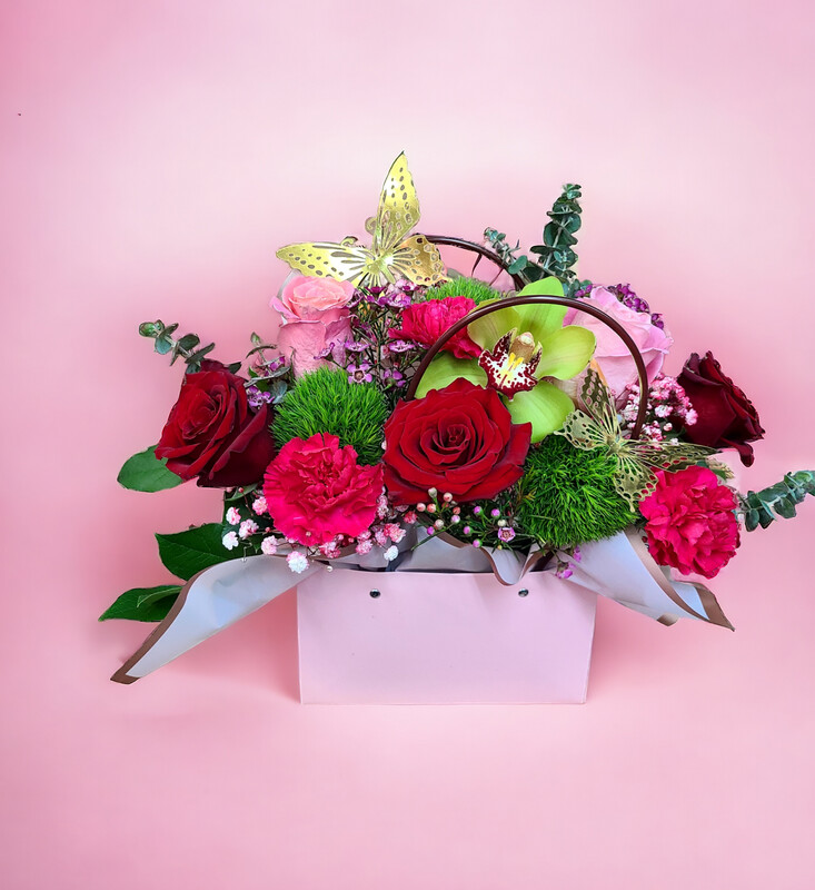 Mixture Of Flowers In Handbag