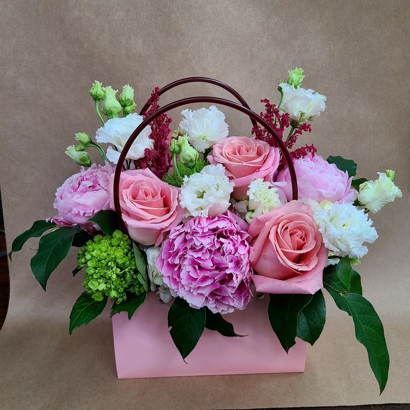 Deluxe Pink Flowers In Handbag