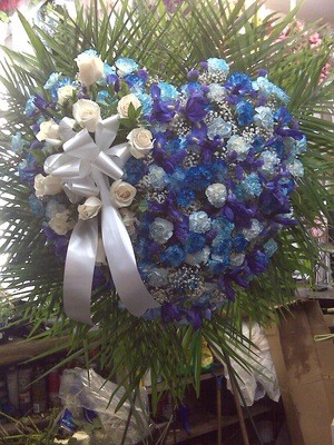 X-Large Heart in all Shades of Blue With Cascading White Roses And Orchids