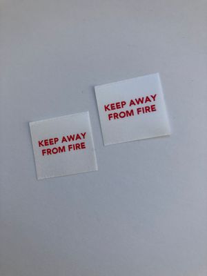 Keep Away From Fire Labels – Satin Safety Tags for Clothing &amp; Textiles