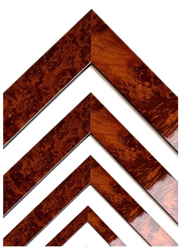 Frame veneered with root wood, high-gloss lacquered, simple, dark profile, groin 10, 20, 40 or 60 mm wide. Tailored to measure.