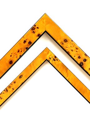 Frame veneered with root wood, high-gloss lacquered, simple, honey-coloured profile, 20 or 30 mm wide strip. Tailored to measure.