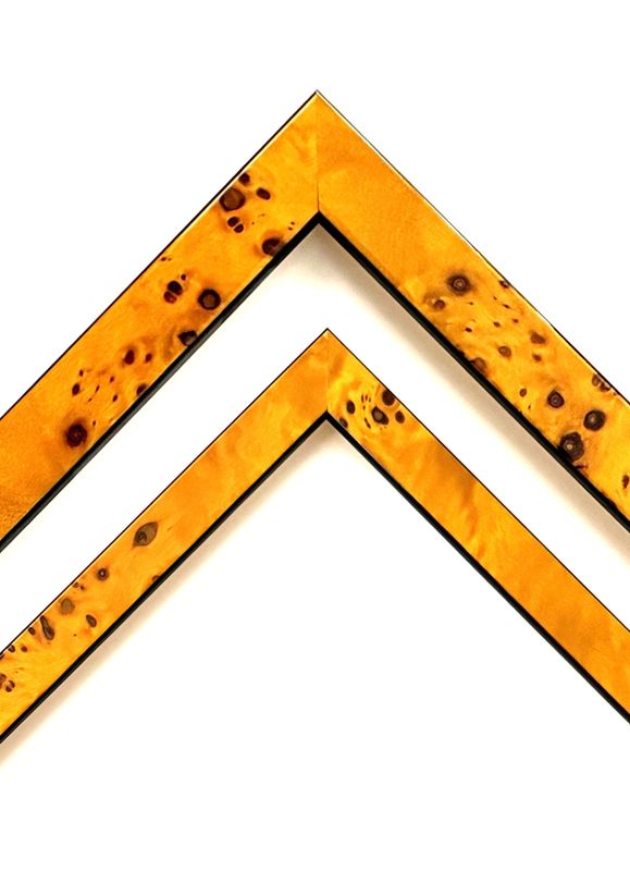 Frame veneered with root wood, high-gloss lacquered, simple, honey-coloured profile, 20 or 30 mm wide strip. Tailored to measure.