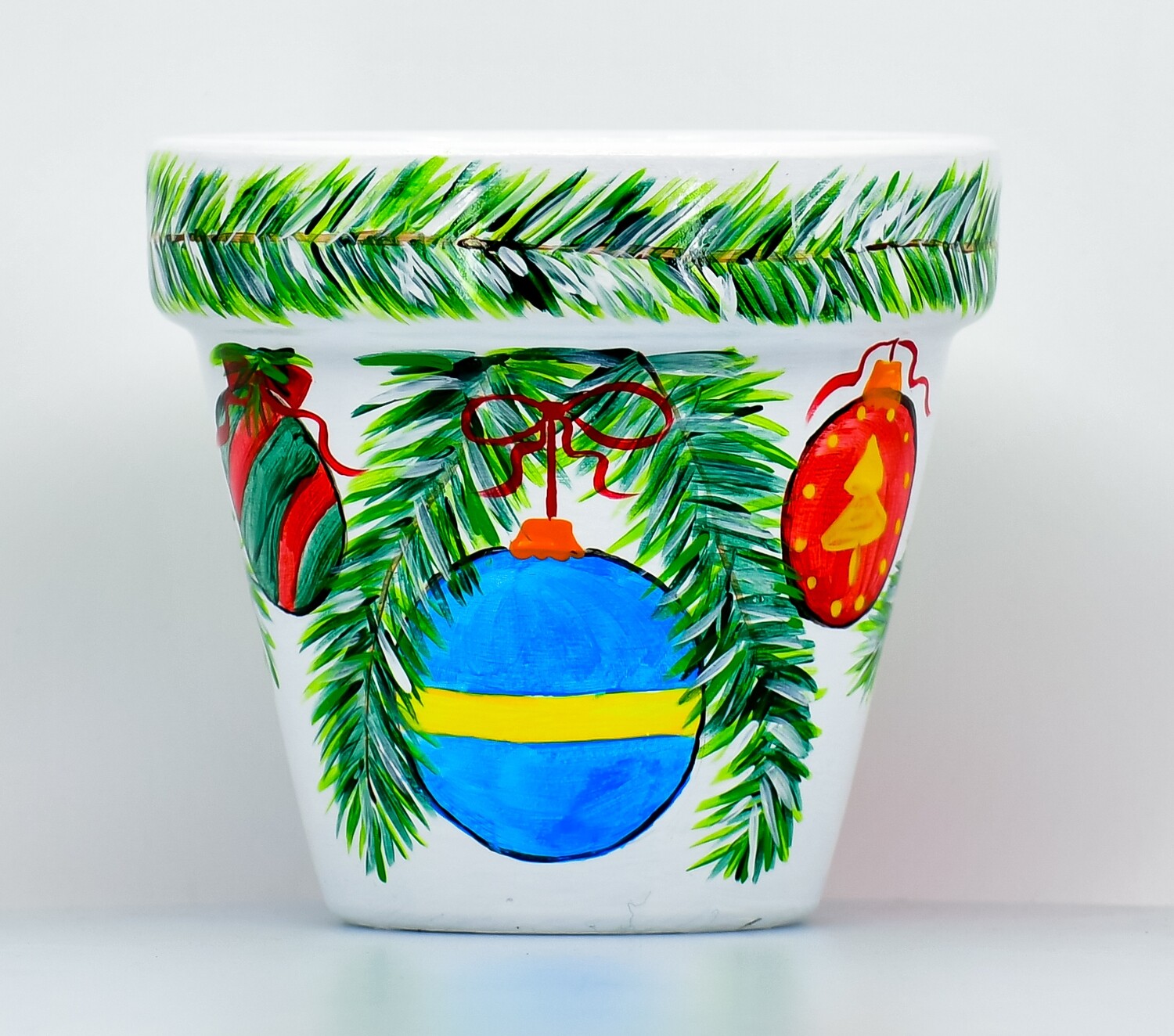 "Decorazioni natalizie" ar rokām apgleznots keramikas puķu vai koku pods