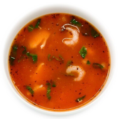 Salmon-shrimp soup with couscous in wine-tomato broth