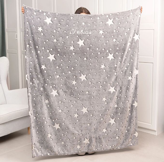 Manta luminosa bordada que brilla en la oscuridad