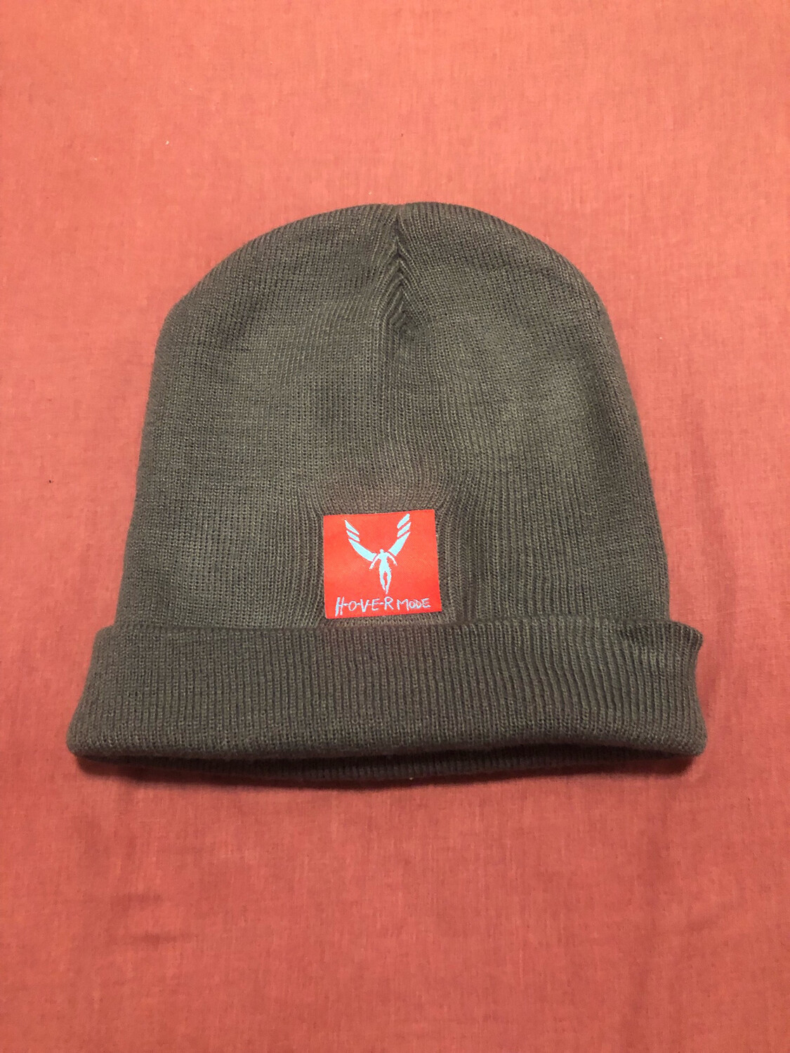 Gray Knit Hat With H-o-v-e-r-mode Patch 